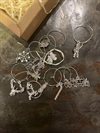 Wine Charms JUL – set med 12 glasmarkörer i silvermetall